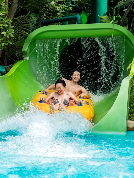 Visitors on the Tidal Twister ride at Adventure Cove Waterpark, Singapore.