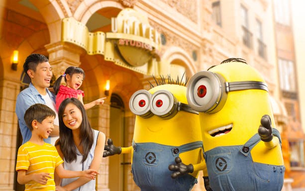 Family enjoying Minions at Universal Studios Singapore entrance.