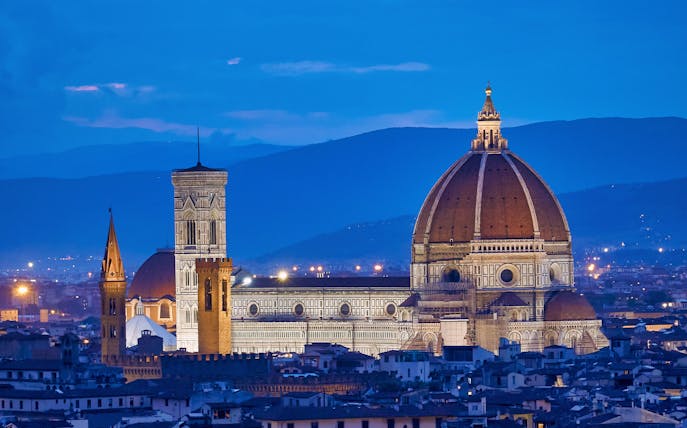 Florence Cathedral and cityscape at dusk, part of Uffizi & Accademia Galleries tour.