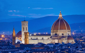 Florence Duomo and cityscape at dusk, view from a guided tour.