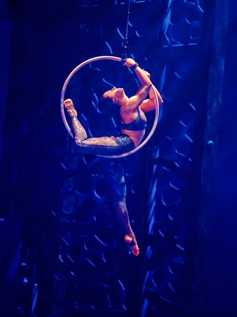 Aerial performer in hoop at La Perle by Dragone show in Dubai.