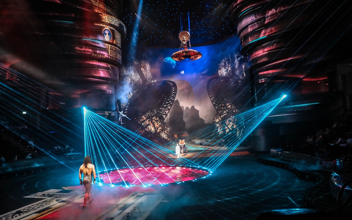 La Perle by Dragone show with performers and vibrant stage lights in Dubai.