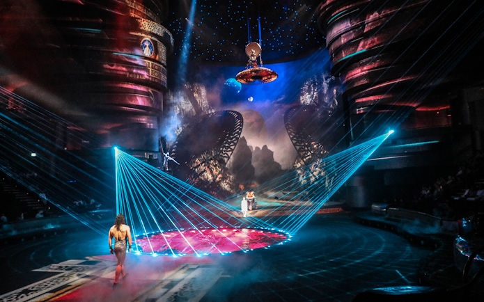 La Perle by Dragone show with performers and vibrant stage lights in Dubai.