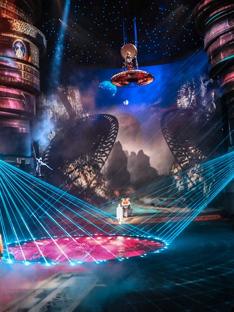 La Perle by Dragone show with performers and vibrant stage lights in Dubai.