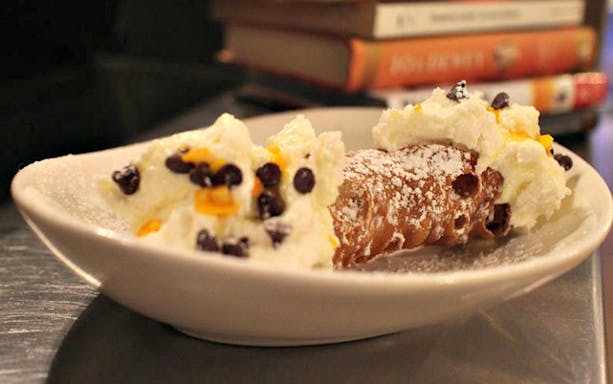 Cannoli dessert with ricotta and chocolate chips on North Beach Food Tour.