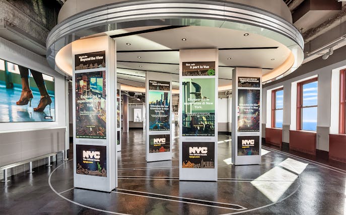 Empire State Building Observatory interior with informational displays.
