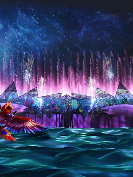 Night show with water, laser, and fire effects at Wings of Time, Sentosa Island, Singapore.