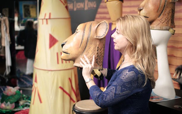Lion King mask at New Amsterdam Theatre during Disney on Broadway tour.