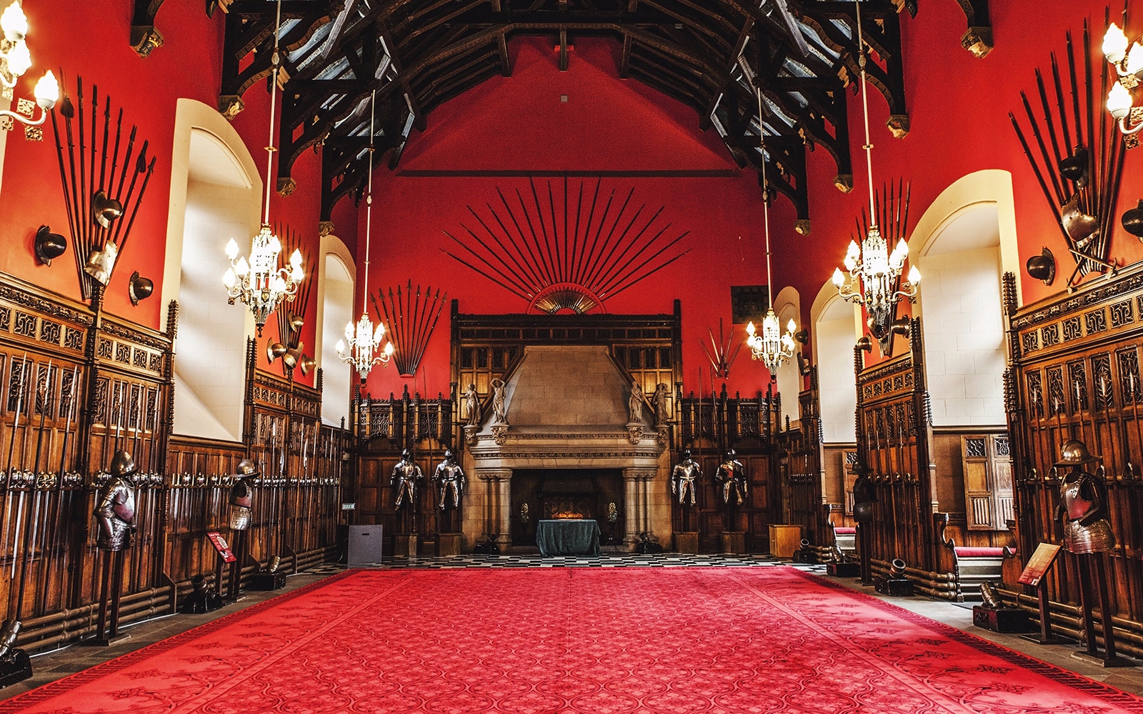Great Hall interior at Edinburgh Castle with medieval armor display.