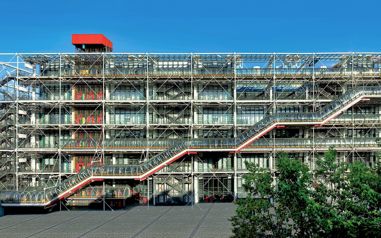 Centre Pompidou exterior with visible escalators and modern architecture in Paris.