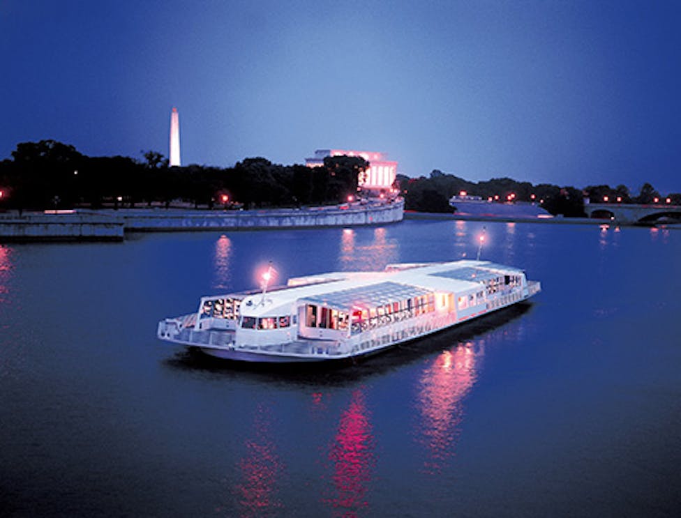 Odyssey Dinner Cruise on Potomac River with Washington DC skyline in background.