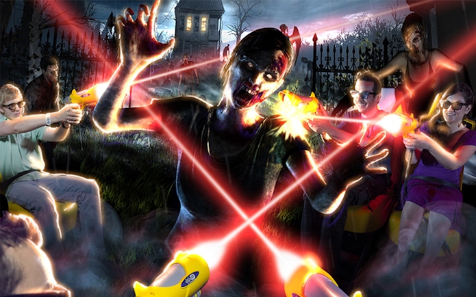 Visitors at Katmandu Park engaging in a zombie-themed laser tag attraction.