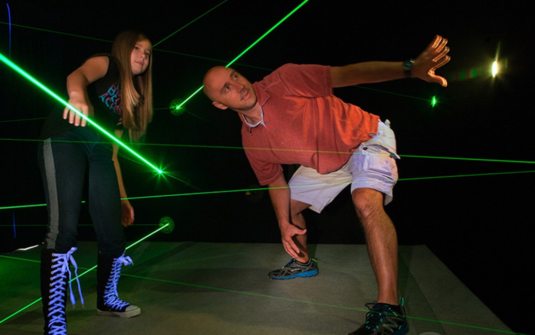 Participants navigating laser maze at Katmandu Park.
