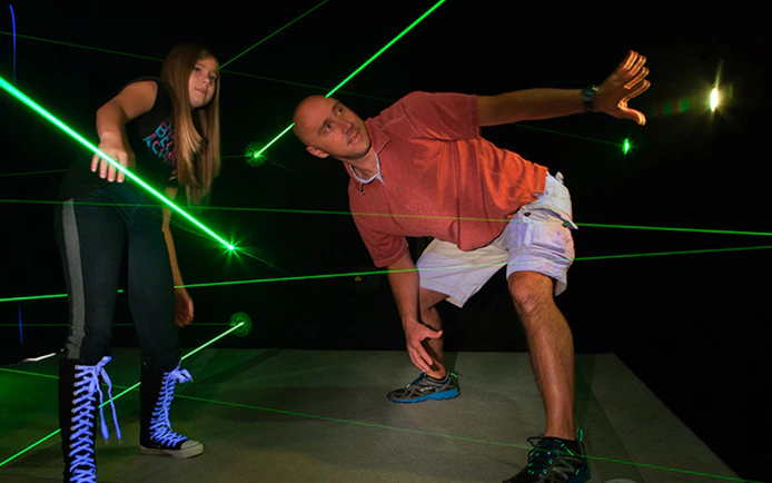 Participants navigating laser maze at Katmandu Park.