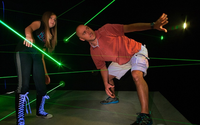 Participants navigating laser maze at Katmandu Park.