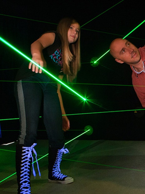 Participants navigating laser maze at Katmandu Park.