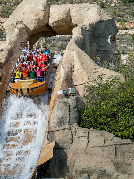 Visitors on a water ride at Terra Mitica, Benidorm, Spain.