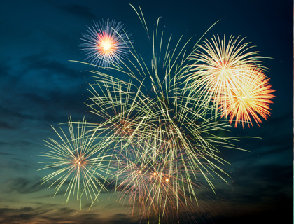 Fireworks display over the ocean during the Wave Dance Night Cruise.