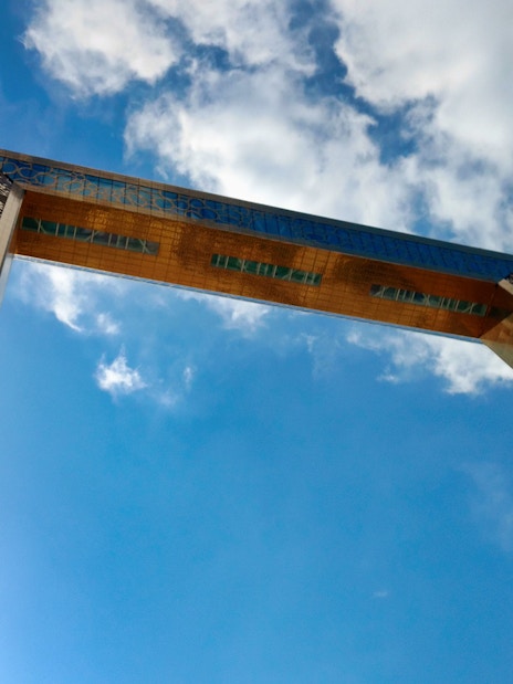 Dubai Frame against a blue sky, part of Combo: Infinity des Lumières tour.