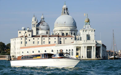 Water taxi near Basilica di Santa Maria della Salute, Venice.