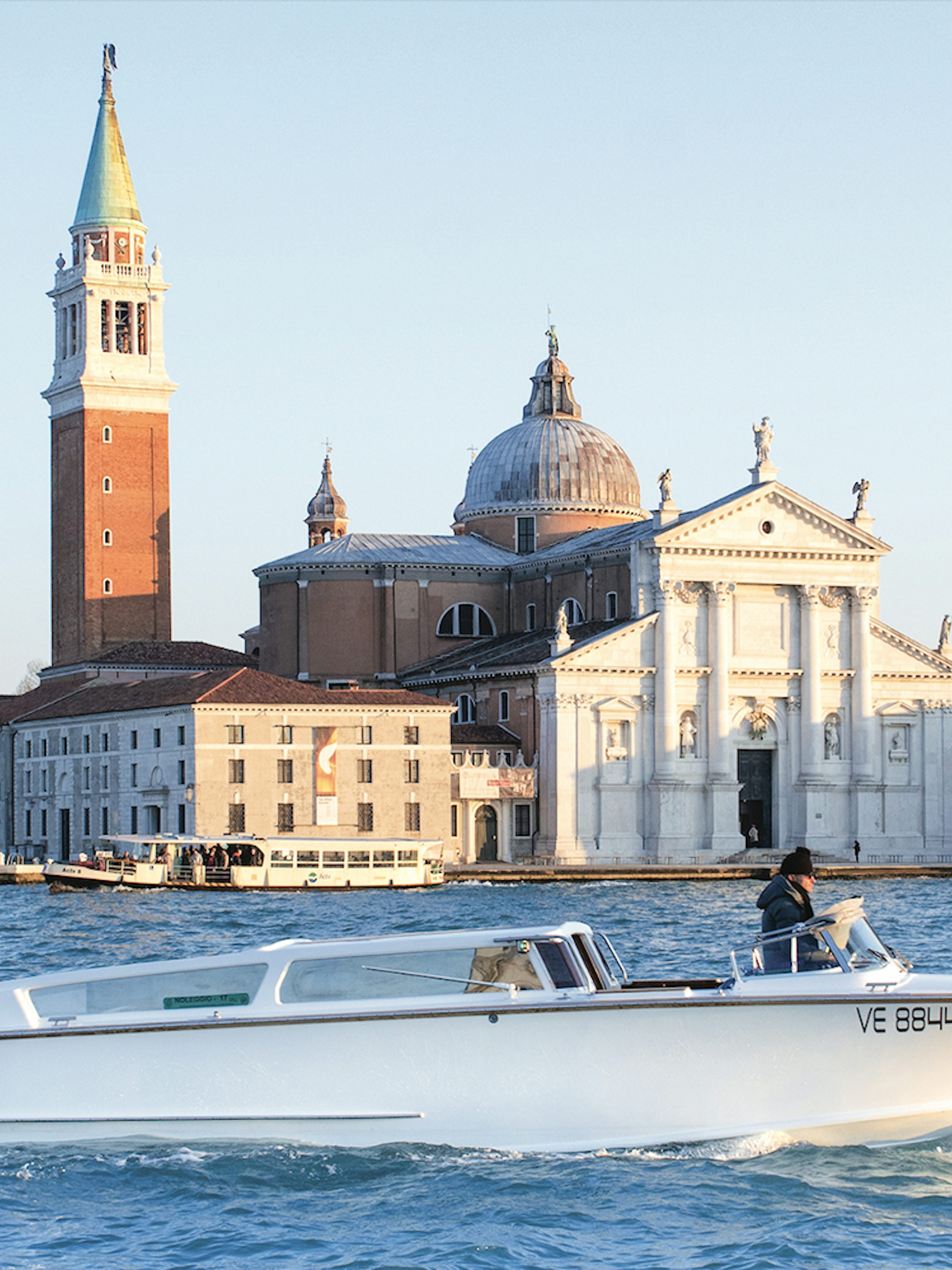 Water taxi cruising near San Giorgio Maggiore in Venice, Italy.