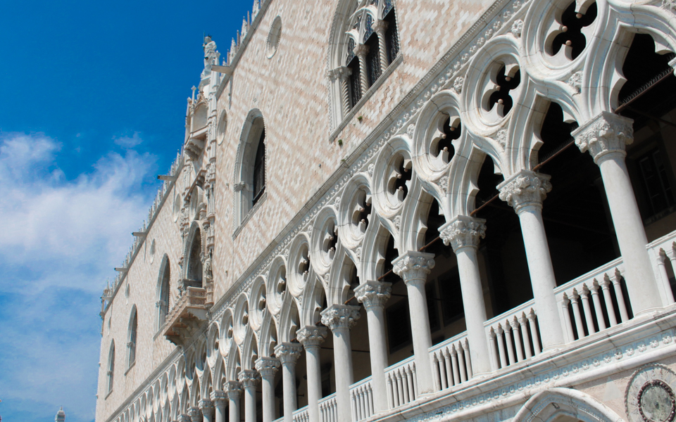 Doge’s Palace facade with Gothic arches in Venice, part of 3-Museum Pass tour.