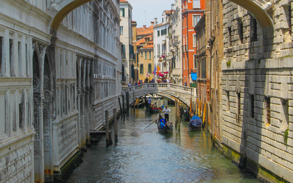 Gondolas on a canal near the Bridge of Sighs in Venice, Italy.