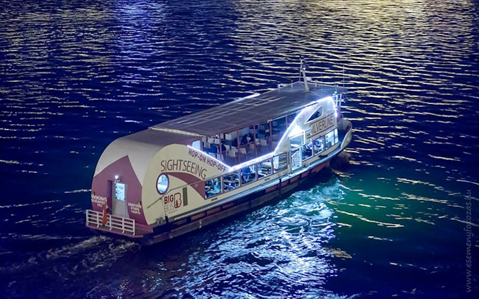 Sightseeing cruise boat on the Danube River at night, Budapest.