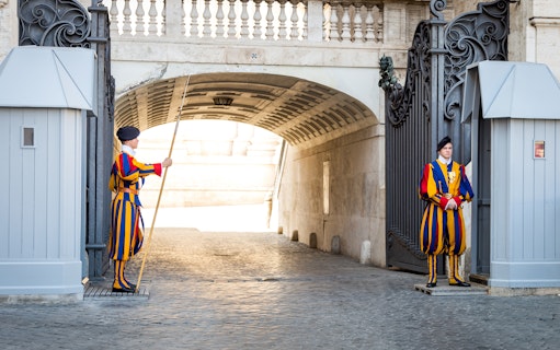 Swiss Guards at Vatican entrance during full day guided tour with skip the line access.