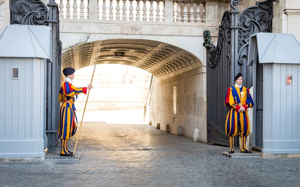 Swiss Guards at Vatican entrance during full day guided tour with skip the line access.