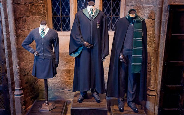 Slytherin student uniforms displayed at Warner Bros. Studio Harry Potter Tour.