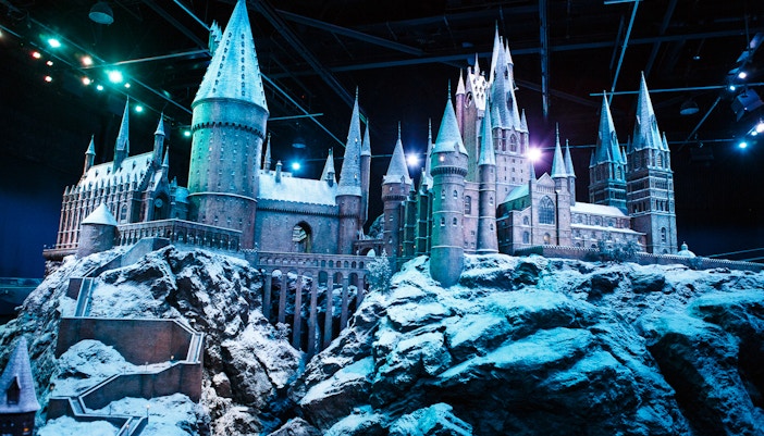 Hogwarts model at Warner Bros. Studio Harry Potter Tour, snow-covered castle with towers.