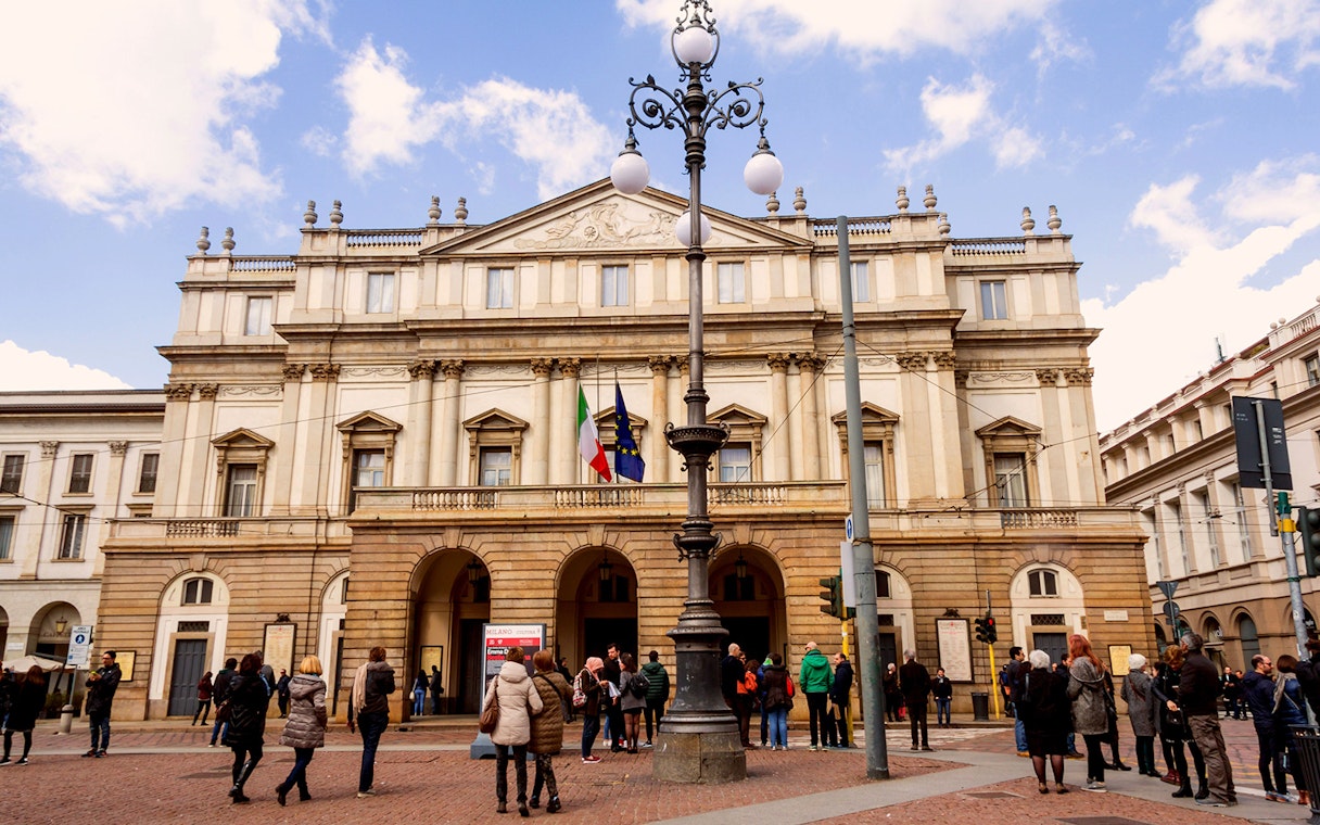 La Scala Opera House in Milan with visitors outside.