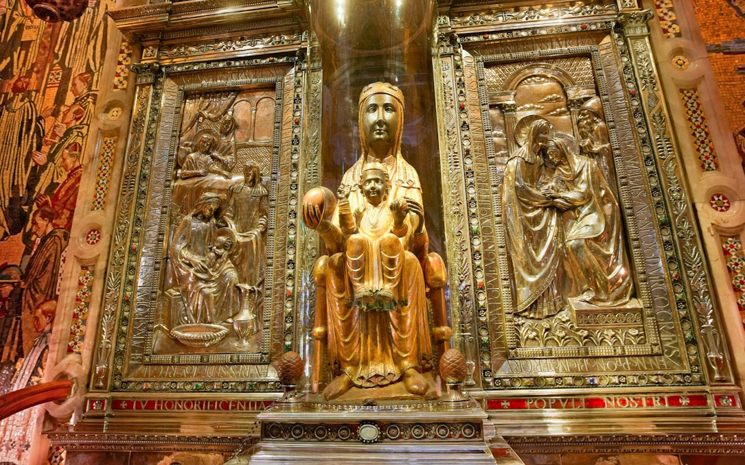 Black Madonna statue at Montserrat Monastery, part of morning tour with cog-wheel train ride.