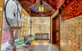 Casa Vicens interior with decorative tiles and latticework in Barcelona.
