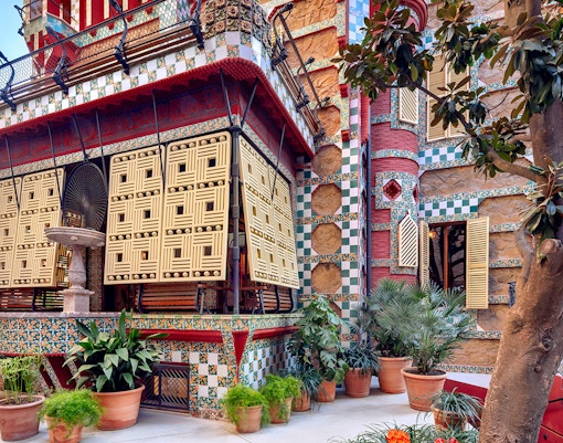 Casa Vicens facade with colorful tiles and intricate latticework in Barcelona.
