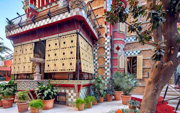 Casa Vicens facade with colorful tiles and intricate latticework in Barcelona.