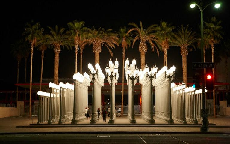 Urban Light installation at Los Angeles County Museum of Art at night.