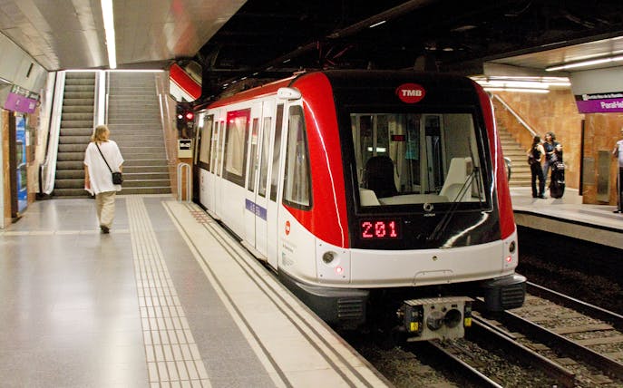 Barcelona metro train at a station platform, part of the Barcelona Express 2 Day Card experience.