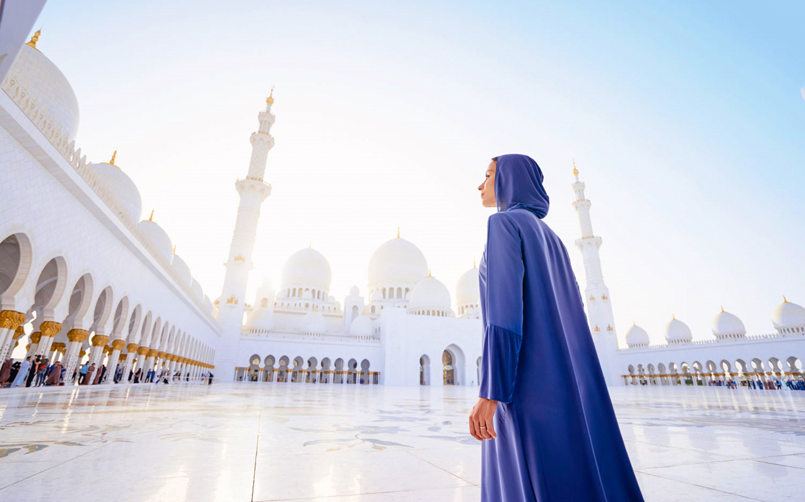 Woman exploring and admiring the architecture of Sheikh Zayed Mosque, Abu Dhabi