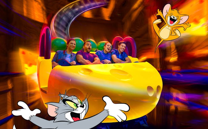 Visitors on a Tom and Jerry themed ride at Warner Bros. World™ Abu Dhabi.