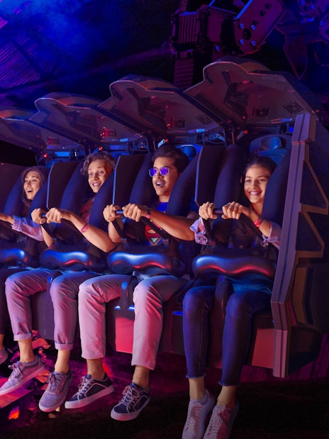 Visitors enjoying a Batman-themed ride at Warner Bros. World Abu Dhabi.
