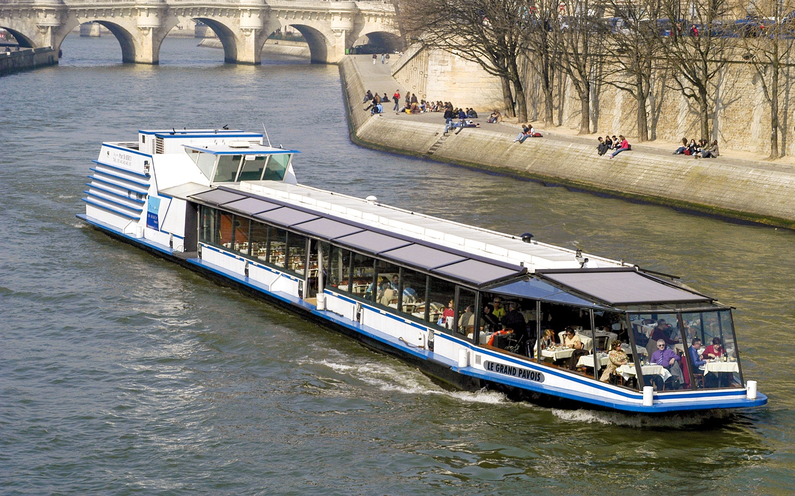 Seine River cruise boat near Orsay Museum, Paris, during La Marina Orsay Lunch Cruise.