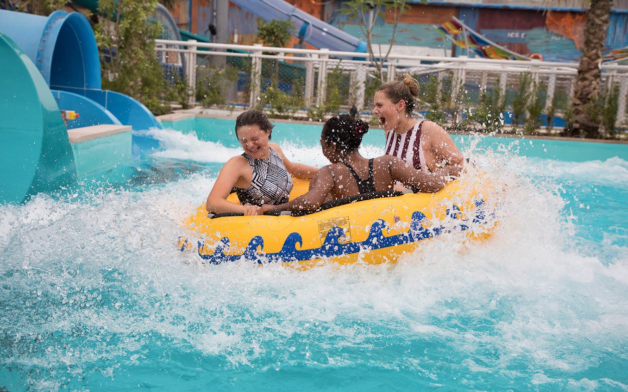 Visitors enjoying a water ride at Laguna Waterpark.