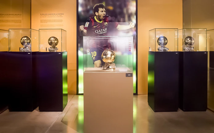 Trophies displayed at FC Barcelona Camp Nou museum during a guided tour.