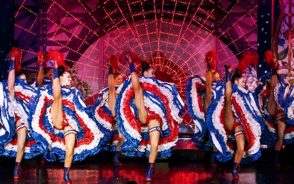 Dancers performing can-can at Moulin Rouge, Paris.