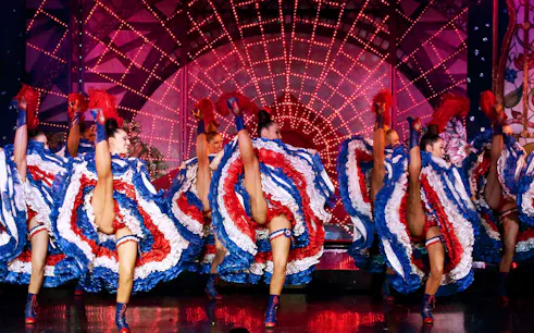 Dancers performing can-can at Moulin Rouge, Paris.