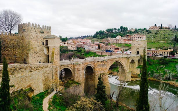Medieval bridge and fortress in Toledo, Spain, part of the 3 Cultures tour.