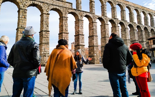 Tour group at Toledo's Roman aqueduct during 3 Cultures guided day trip.