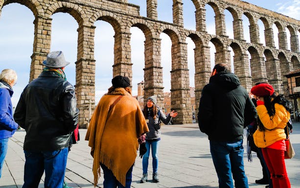 Tour group at Toledo's Roman aqueduct during 3 Cultures guided day trip.